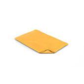 Et gult bønneposetrekk for en hundeseng med memory foam.